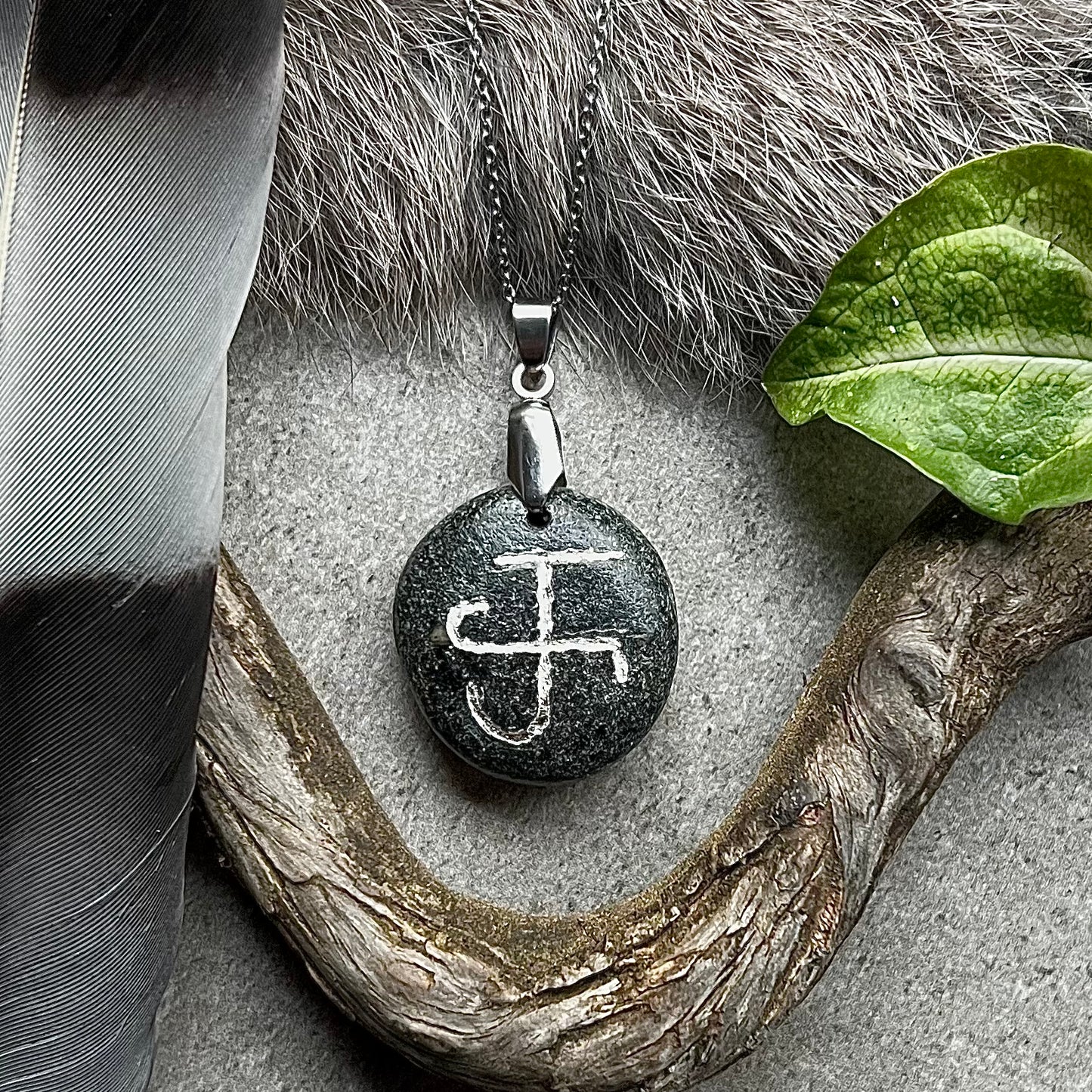 Necklace with hand-carved Icelandic symbol of Thor's hammer made of genuine silver
