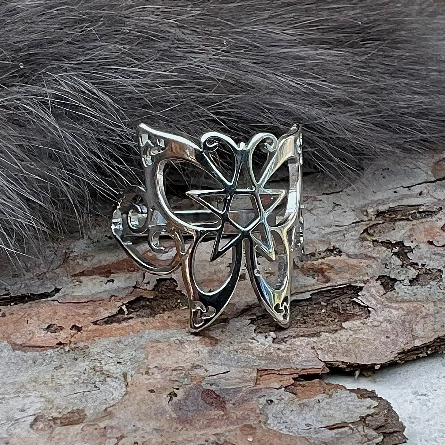 Adjustable stainless steel ring with Celtic patterned butterfly