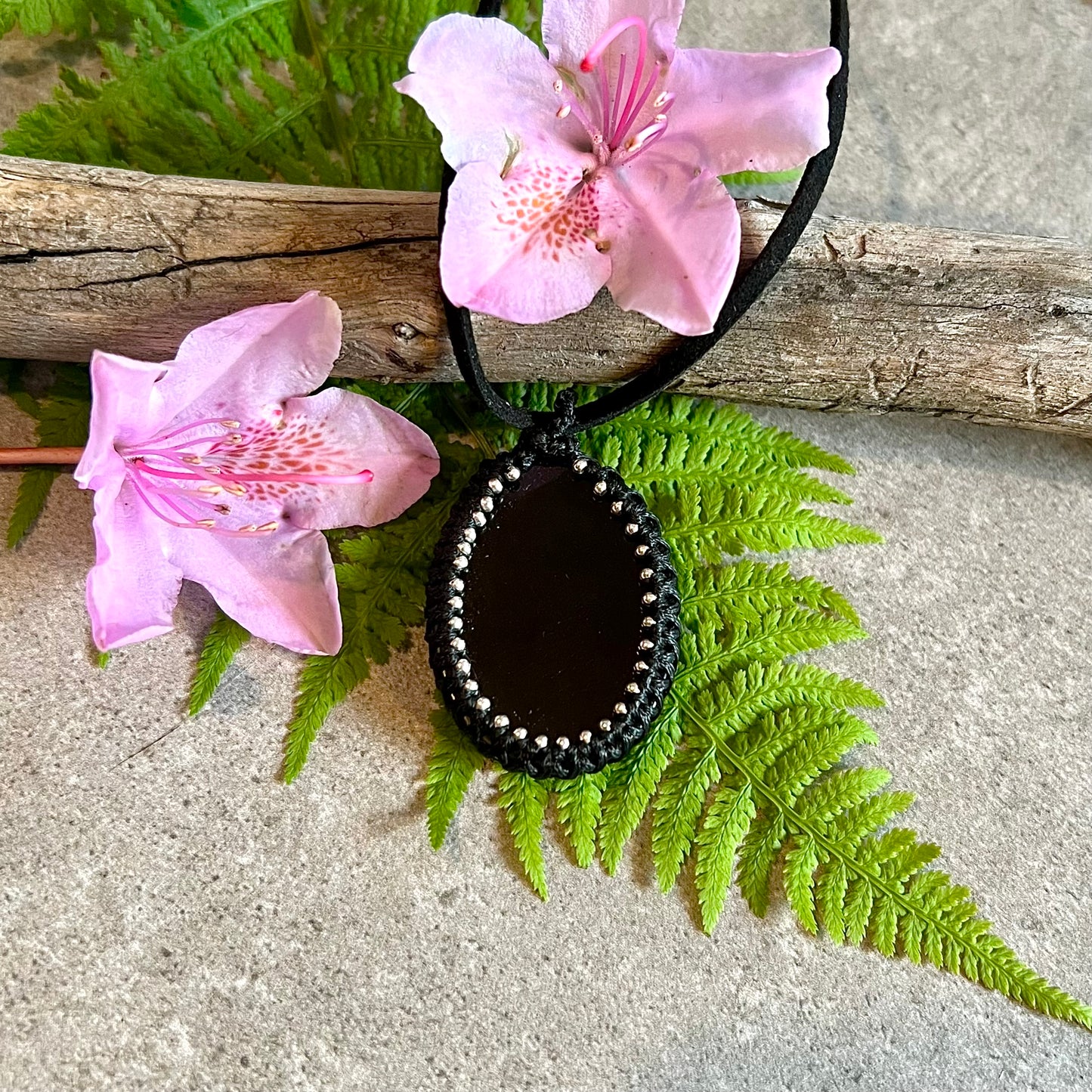 Necklace with bound black agate