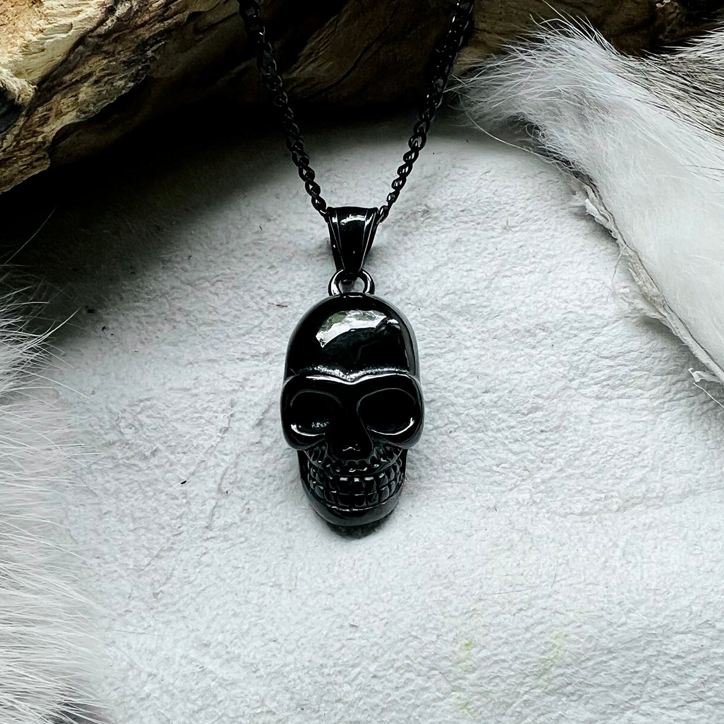 Necklace with skull in black steel