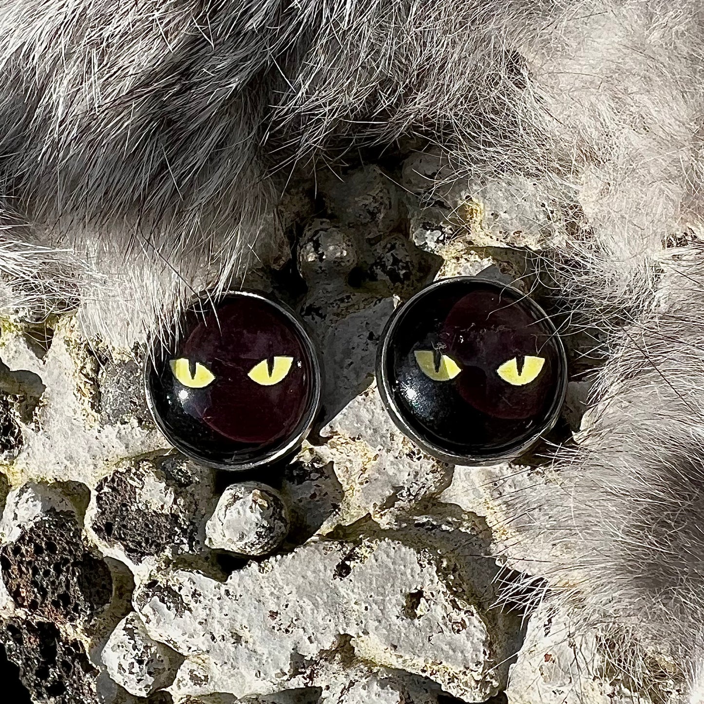 Stainless steel stud earrings with cat eyes