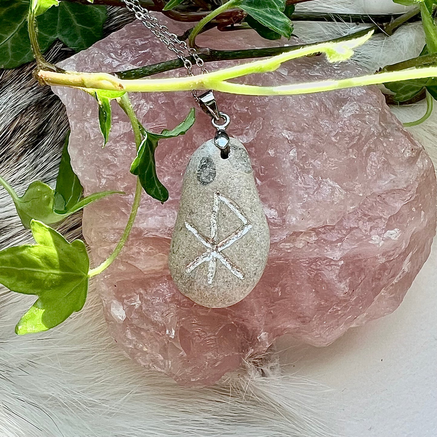 Necklace with hand-carved binding rune "love" in genuine silver