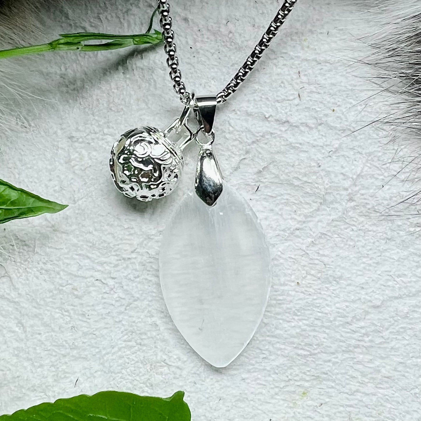Necklace with calcite (the sunstone of the Vikings) and silver bell