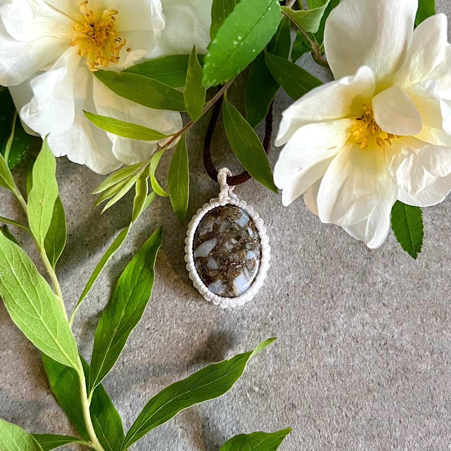 Necklace with bound, gold-lined chalcedony