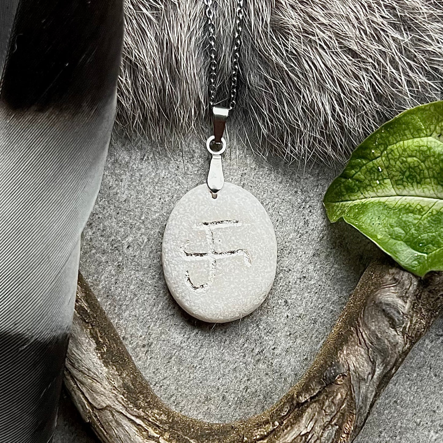 Necklace with hand-carved Icelandic symbol of Thor's hammer in genuine silver