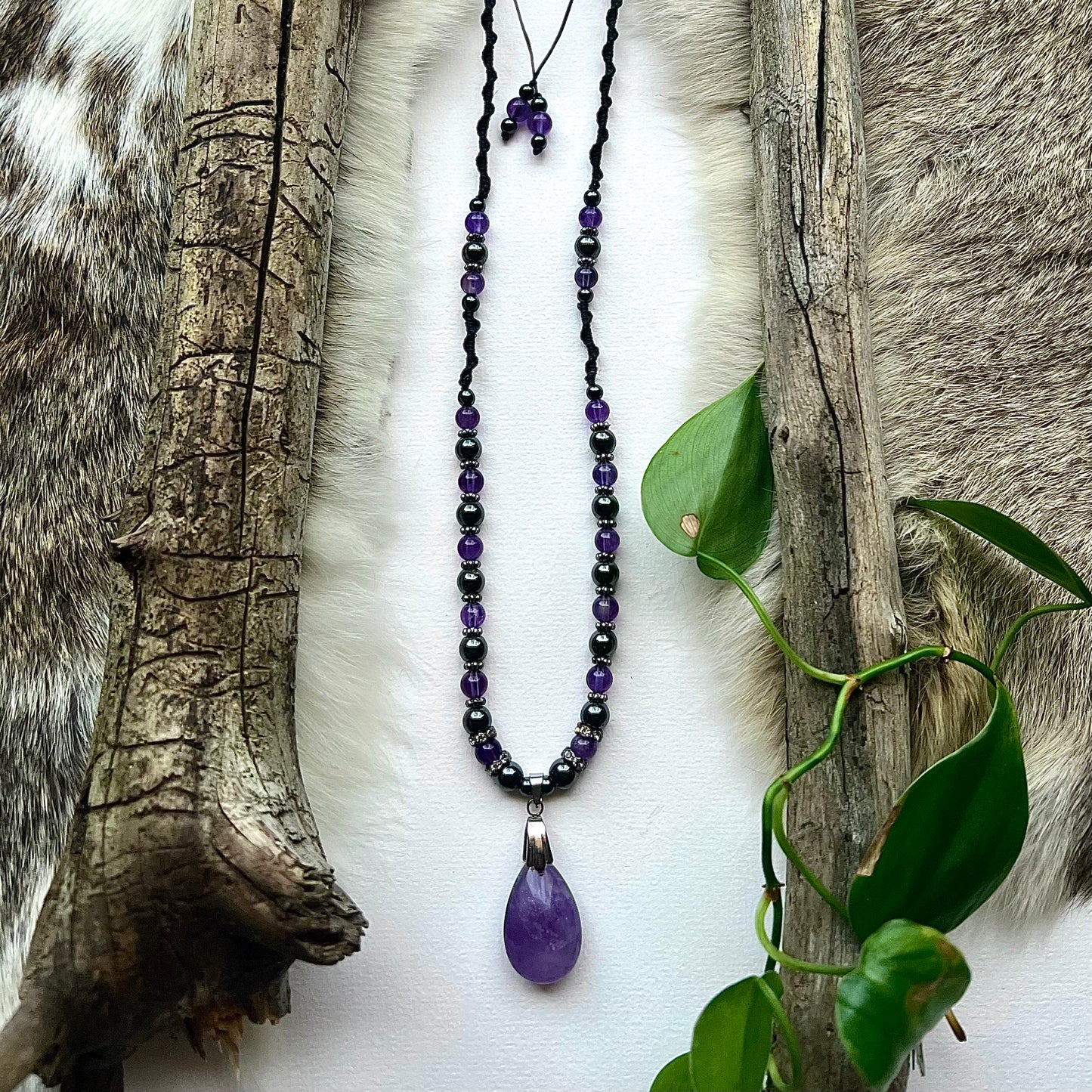 Amethyst and hematite necklace with drop pendant