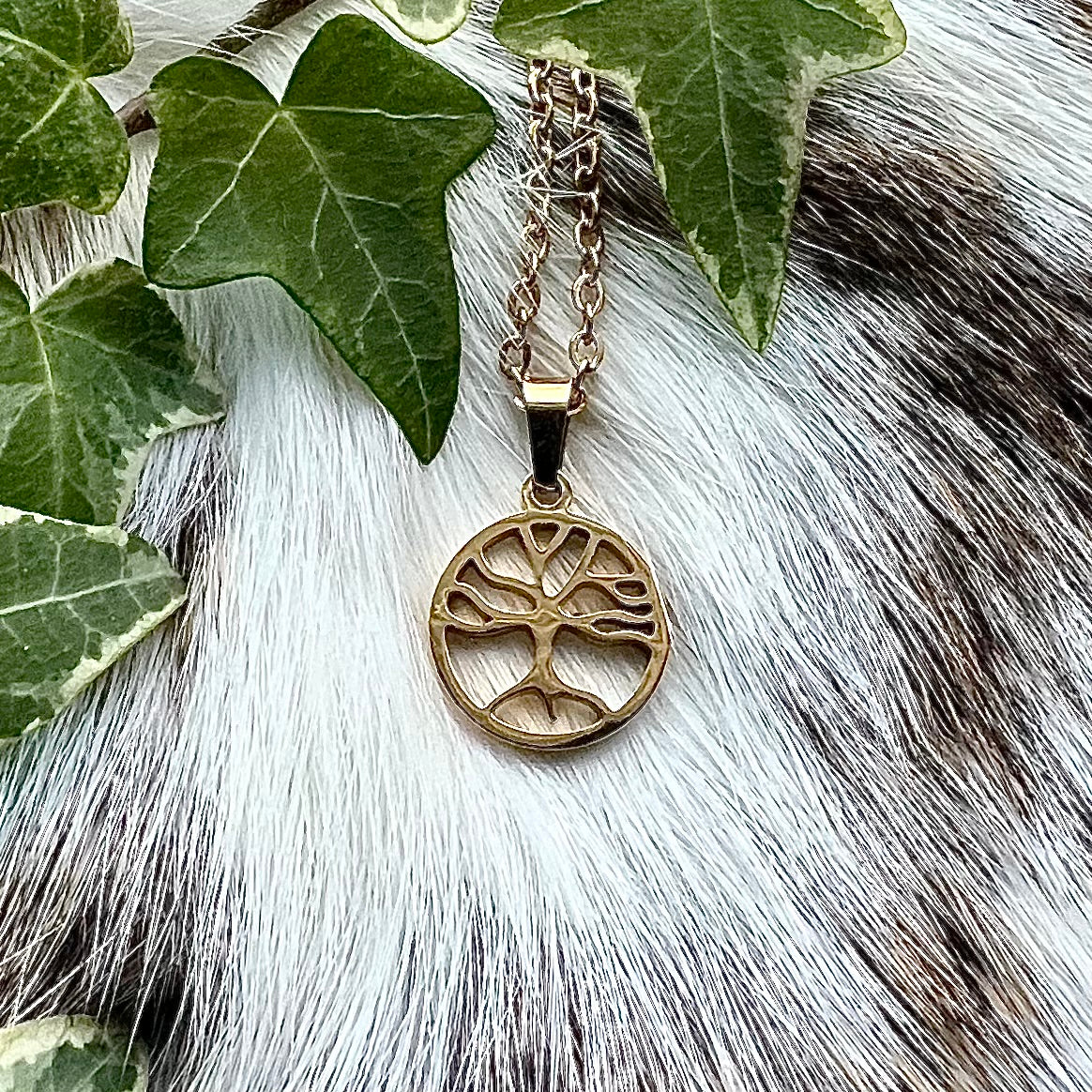 Necklace with small pendant. Yggdrasil in gold-colored, stainless steel