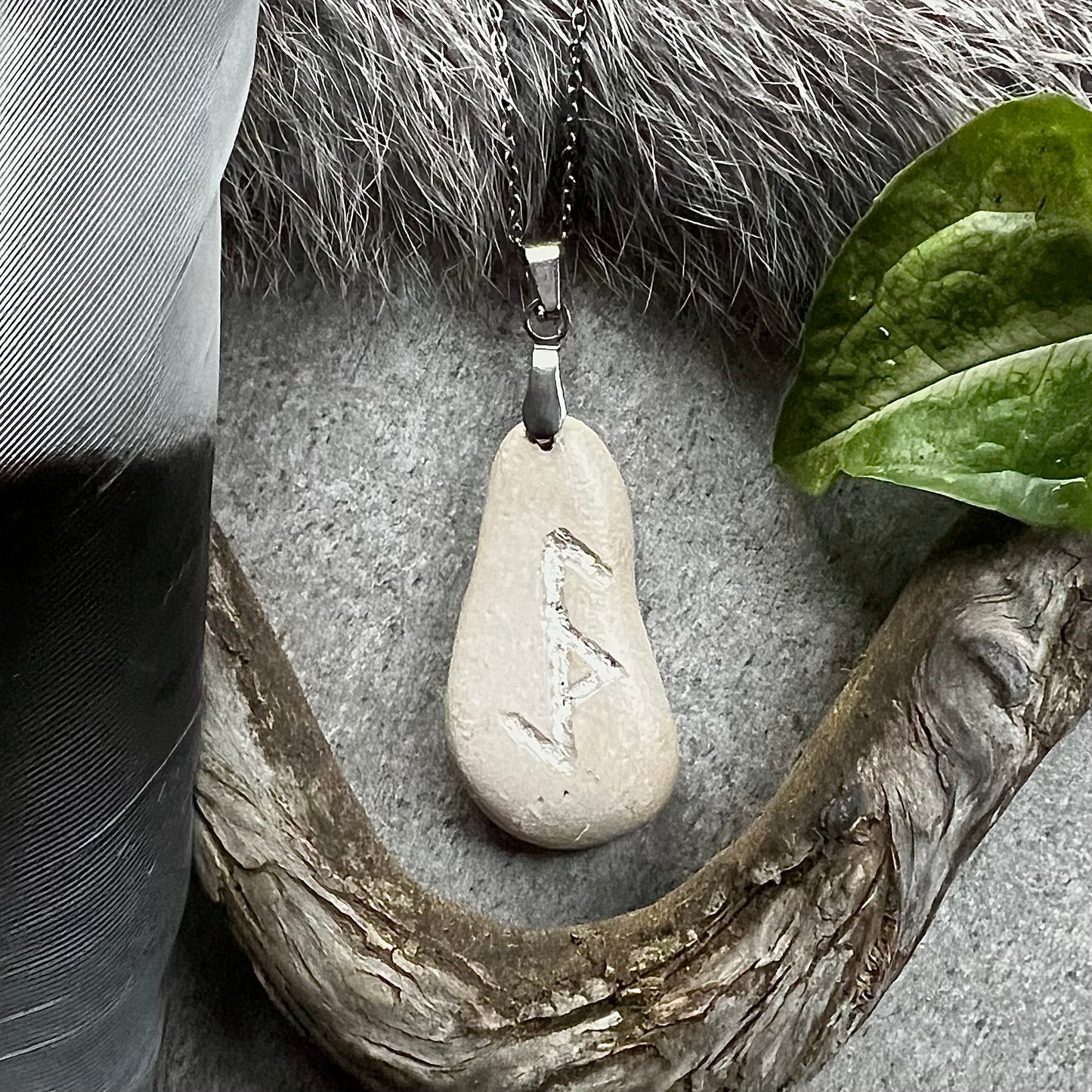 Necklace with hand-carved bind rune against evil magic in genuine silver