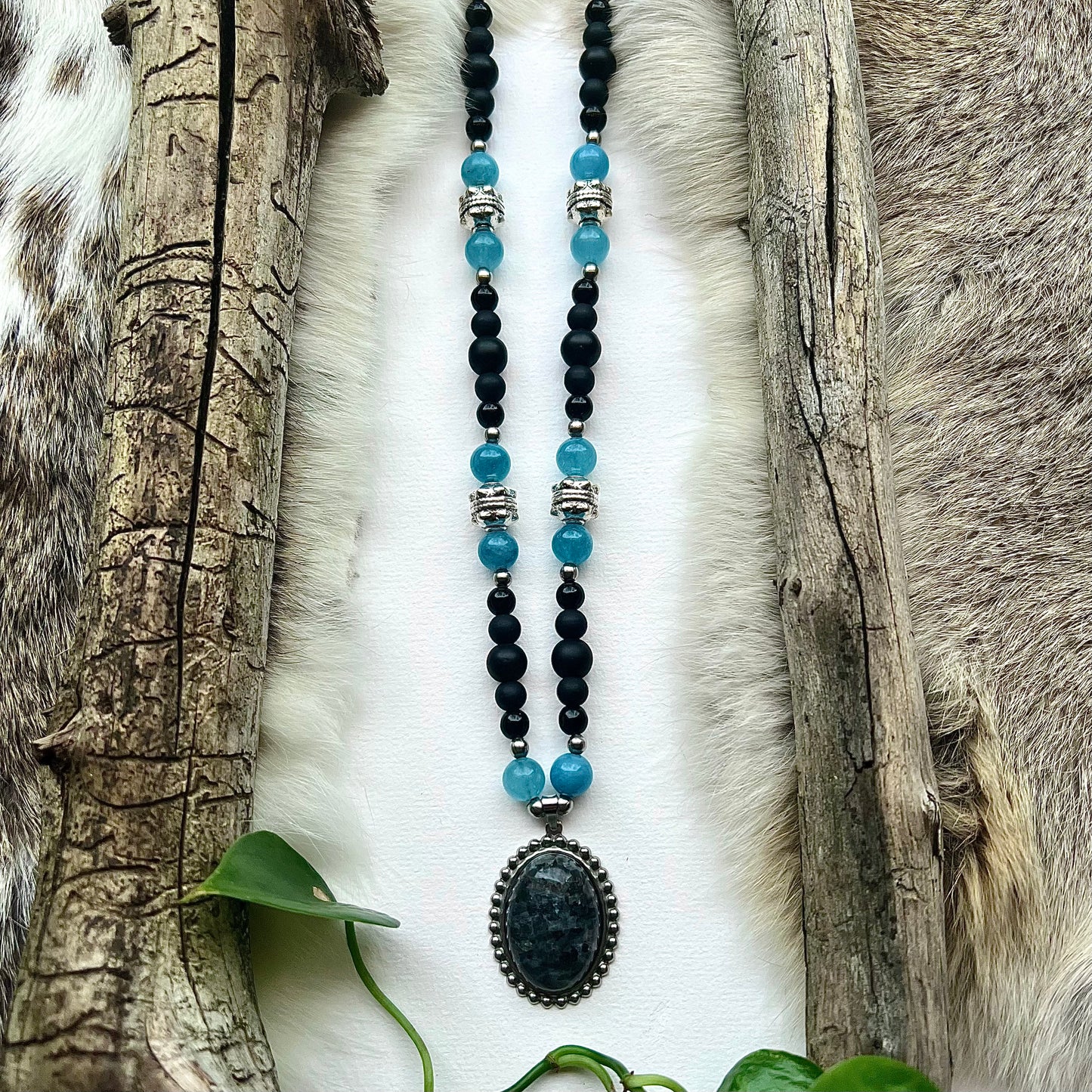 Aquamarine and black glass necklace with labradorite pendant