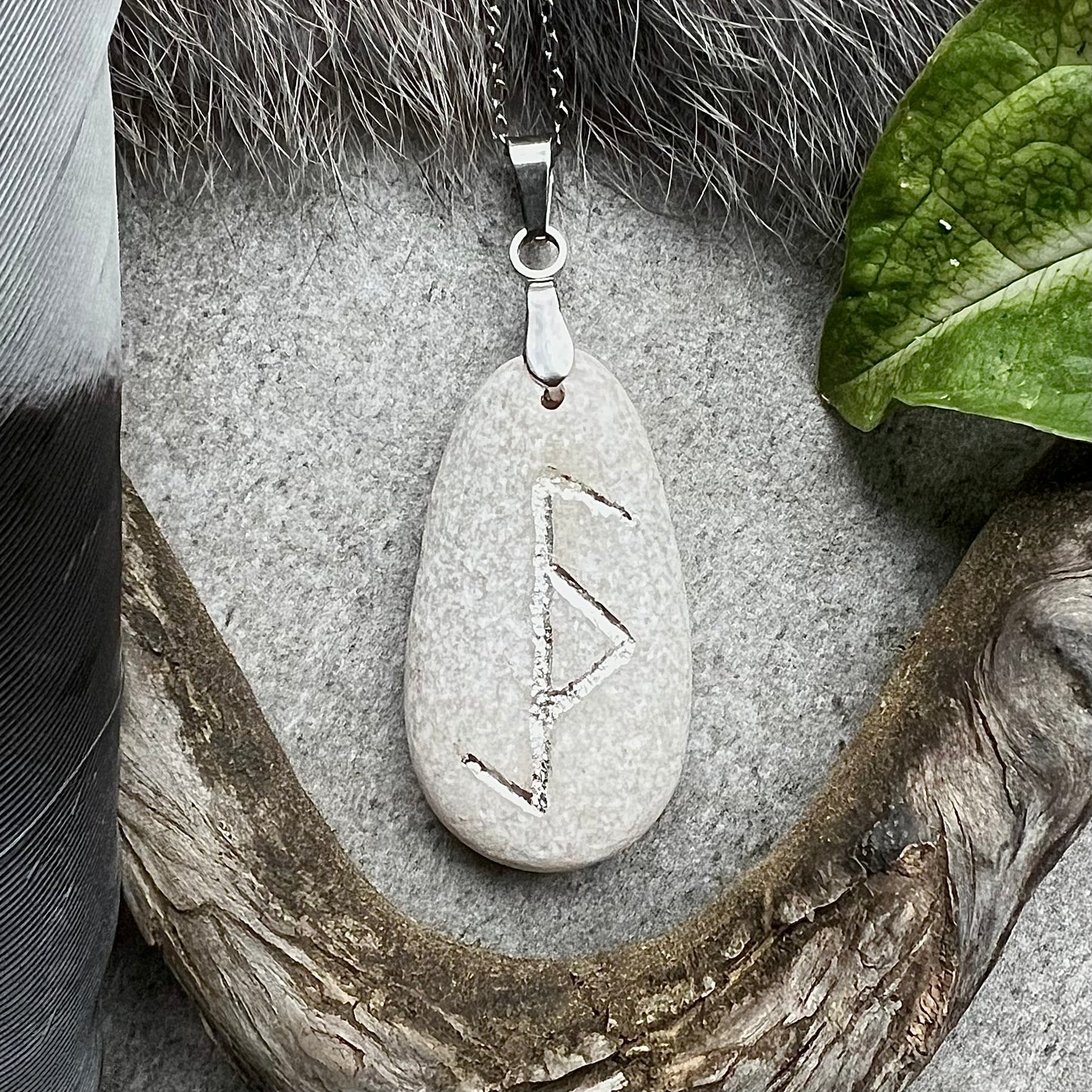 Necklace with hand-carved bind rune against evil magic in genuine silver
