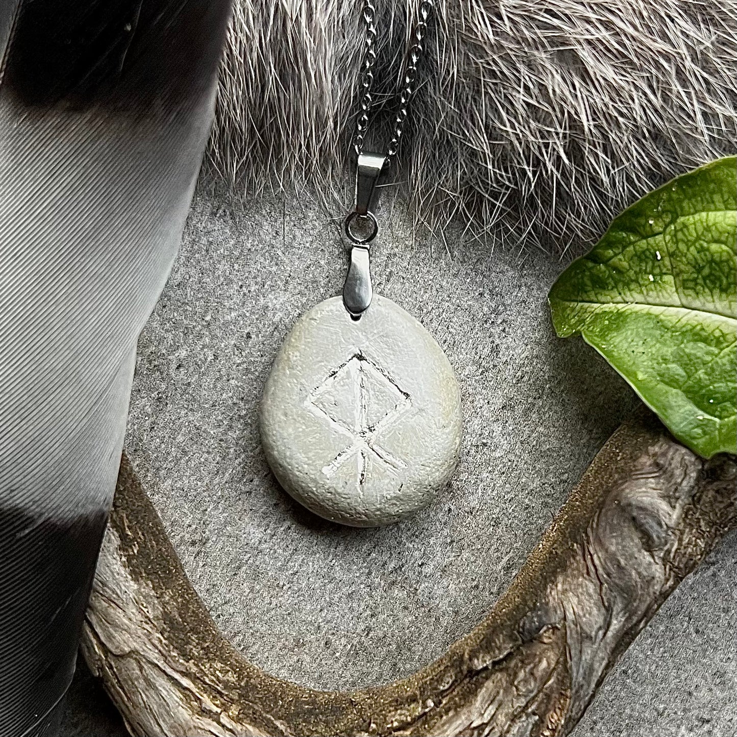 Necklace with hand-carved bind rune for courage in genuine silver