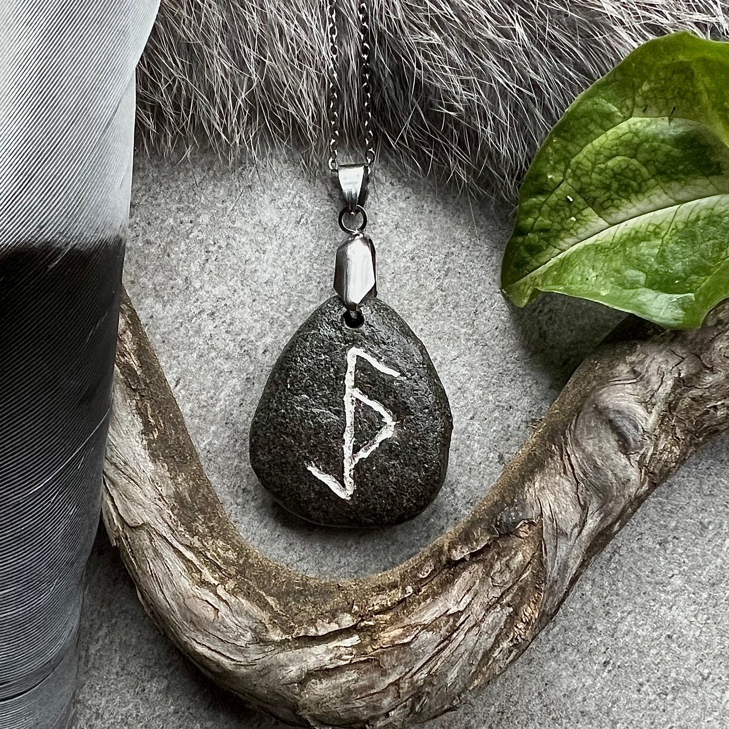 Necklace with hand-carved bind rune against evil magic in genuine silver