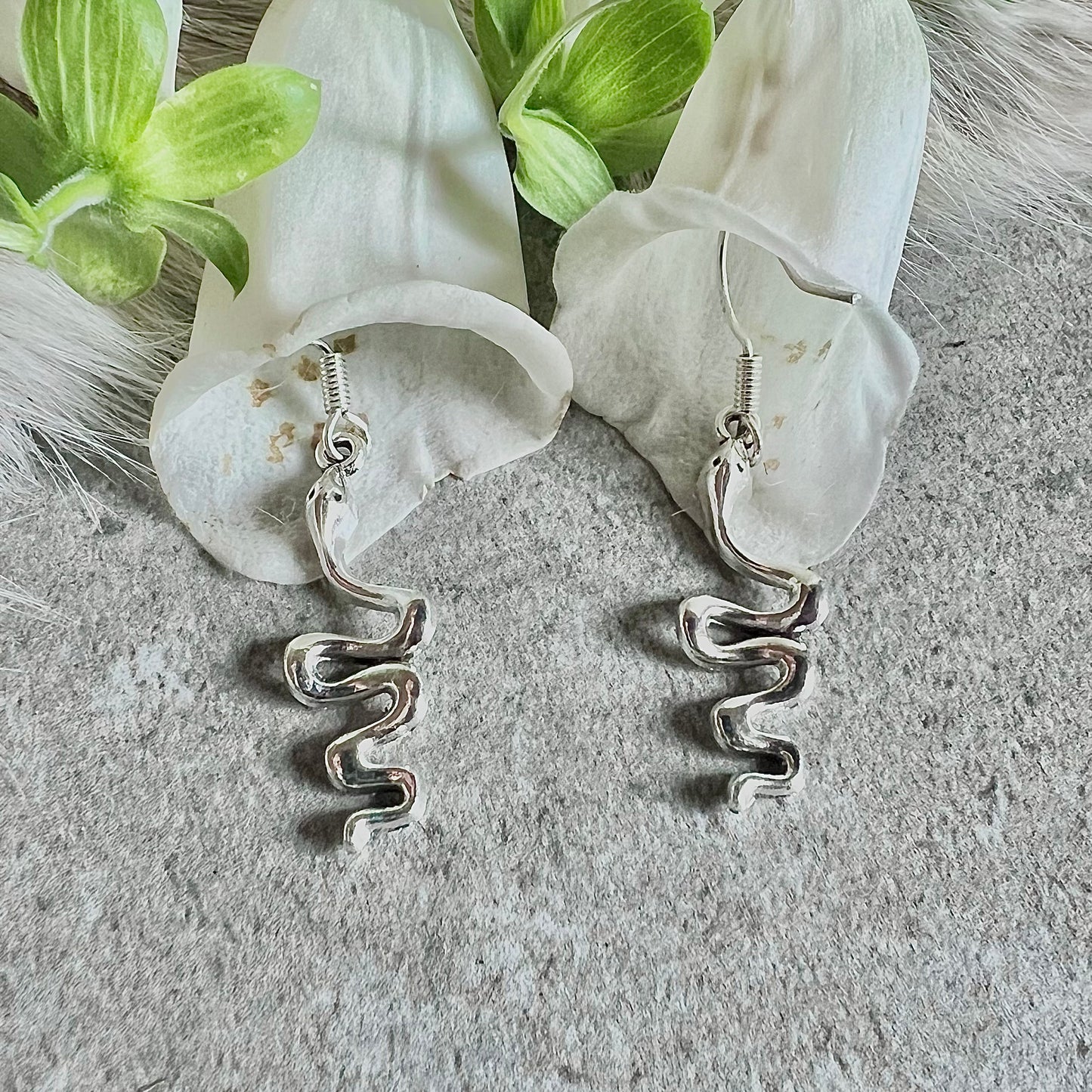 Earrings with snakes on a silver hook