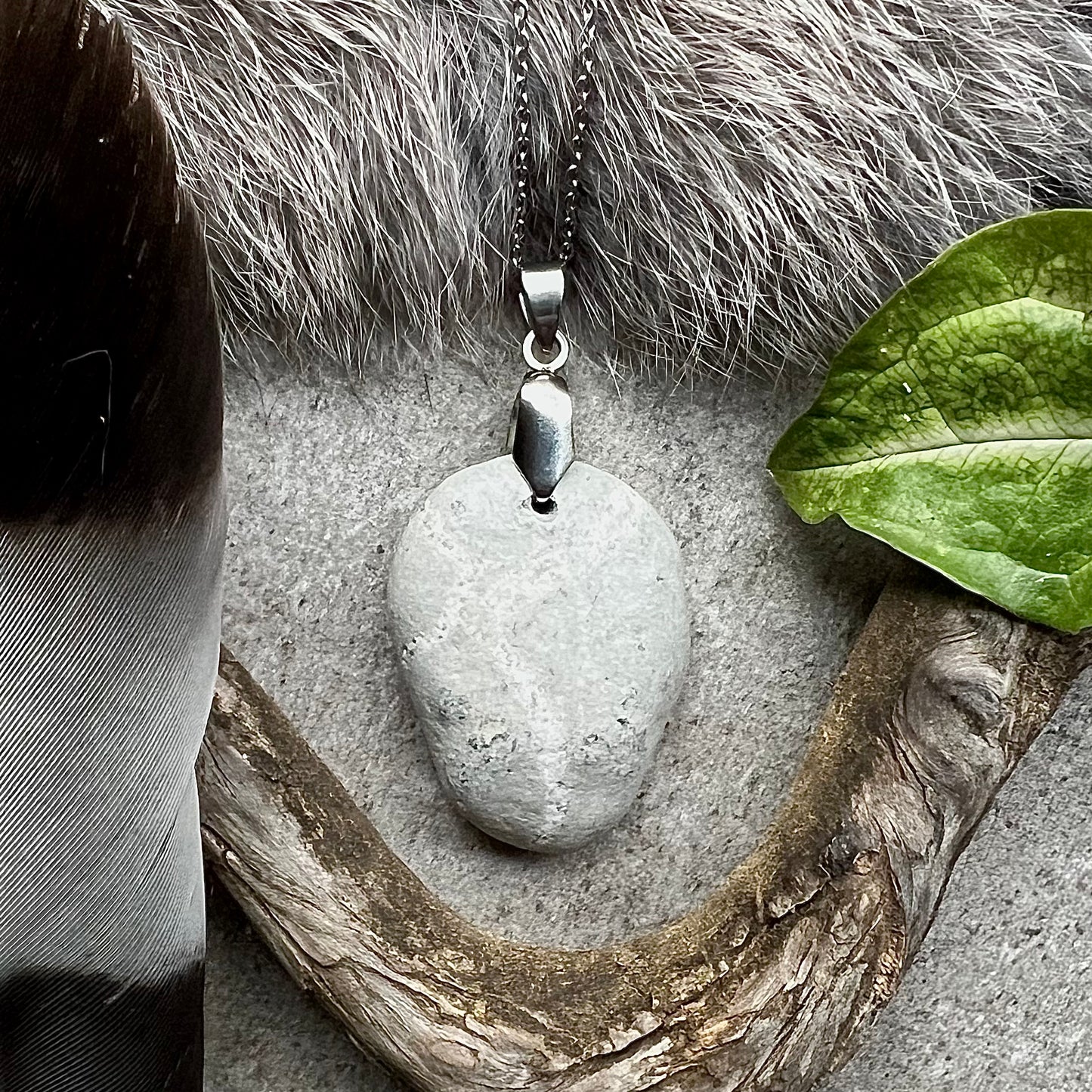 Necklace with a 'wishing stone'. Crystallized band.