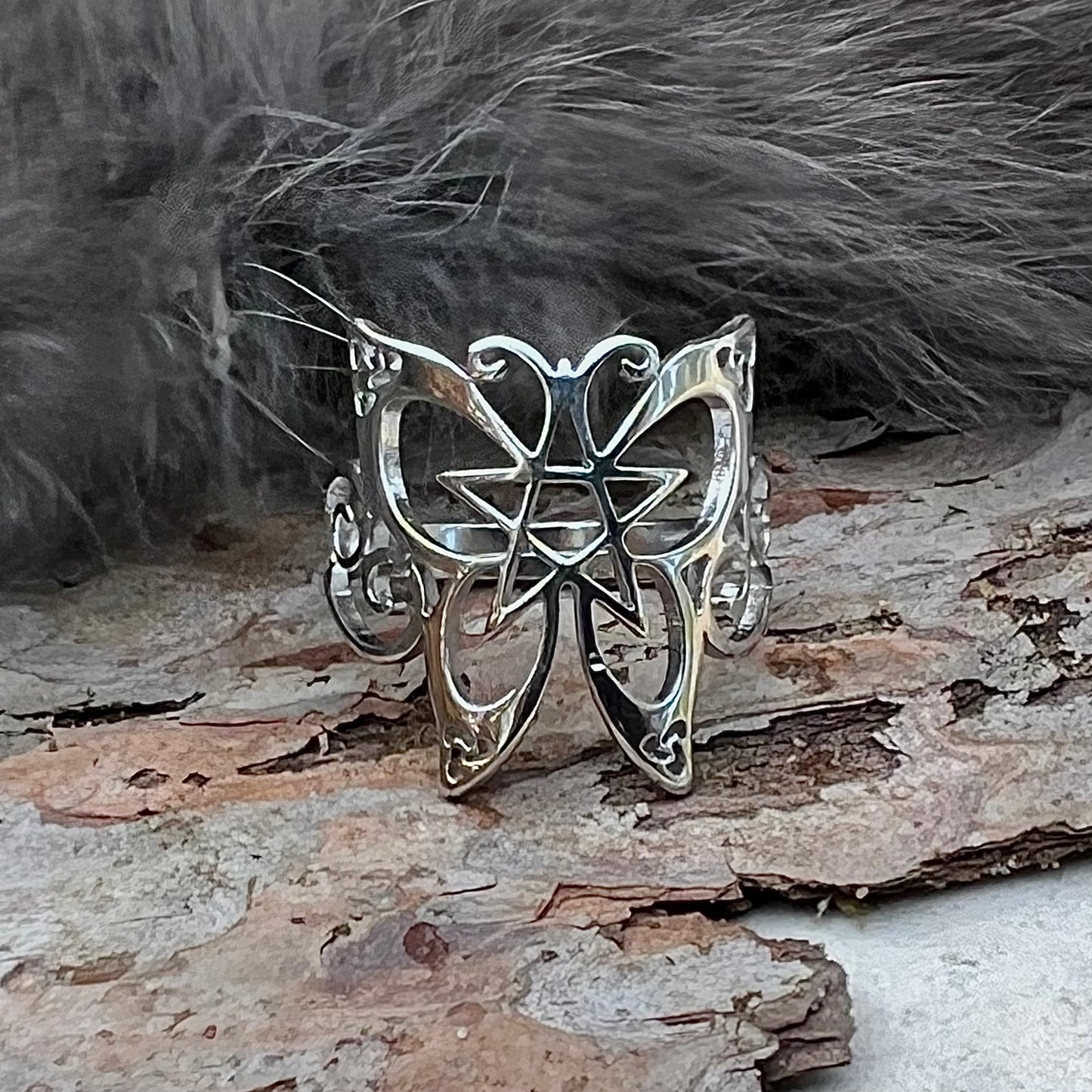 Adjustable stainless steel ring with Celtic patterned butterfly