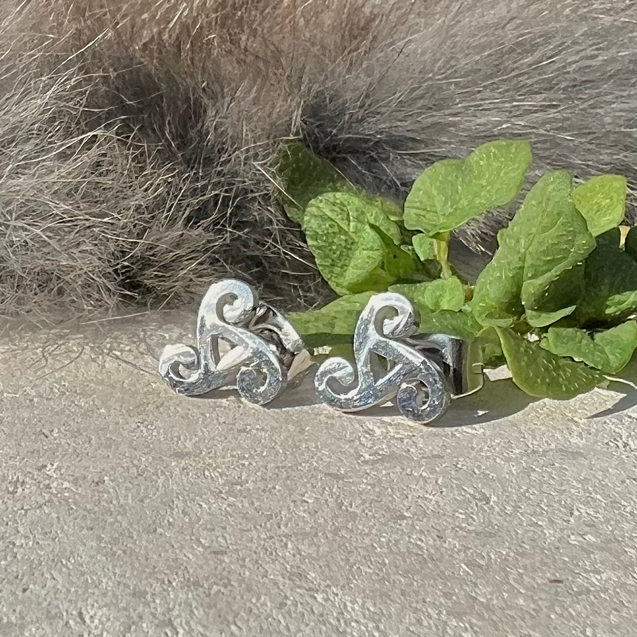 Earrings with studs and Triskelion in stainless steel