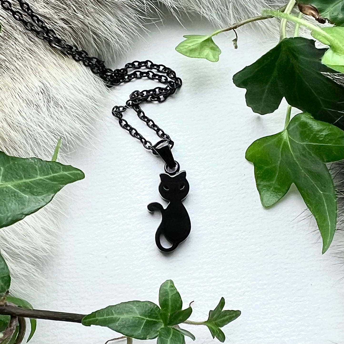 Black, stainless steel necklace with cat