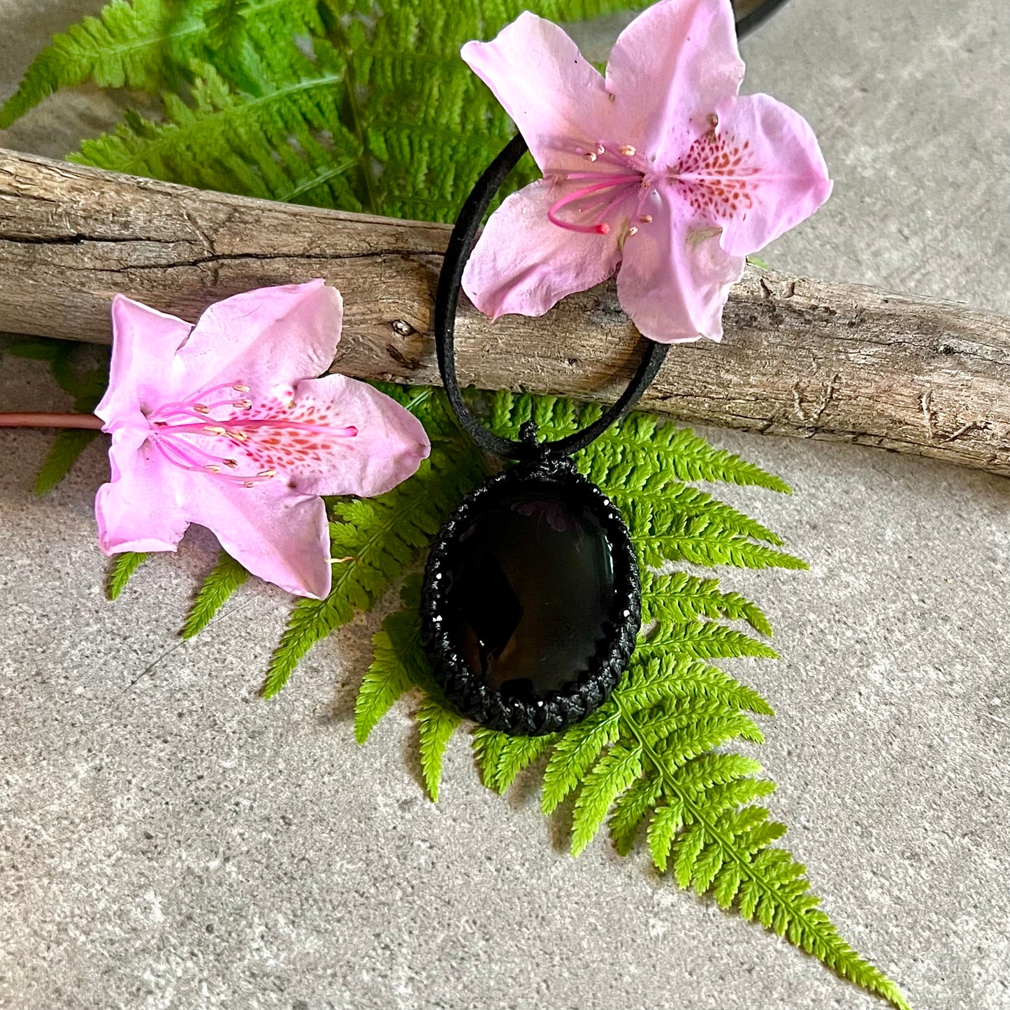 Necklace with bound black agate