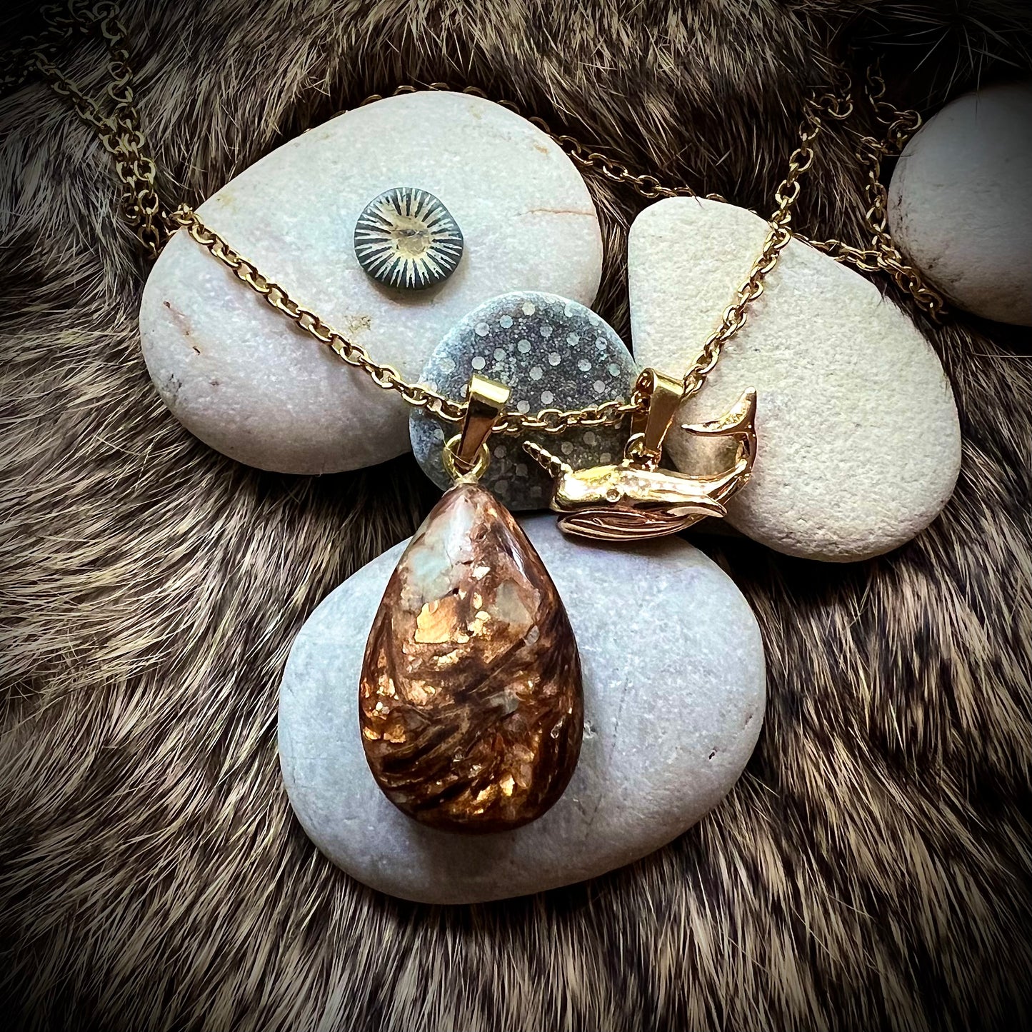 Necklace with drop-shaped bronzite and jasper with gold-plated narwhal