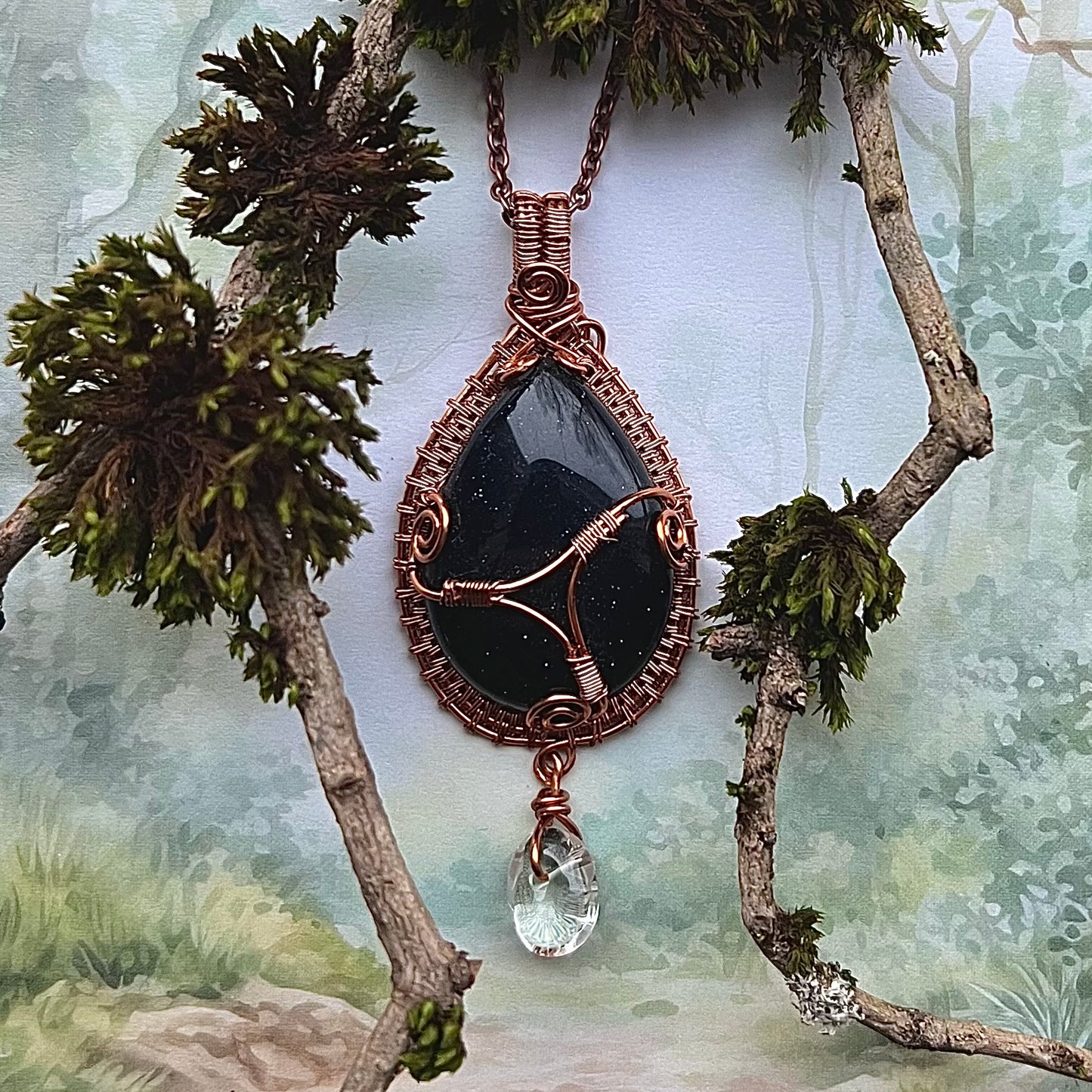 Necklace with drop-shaped blue gold stone, rock crystal and copper wire