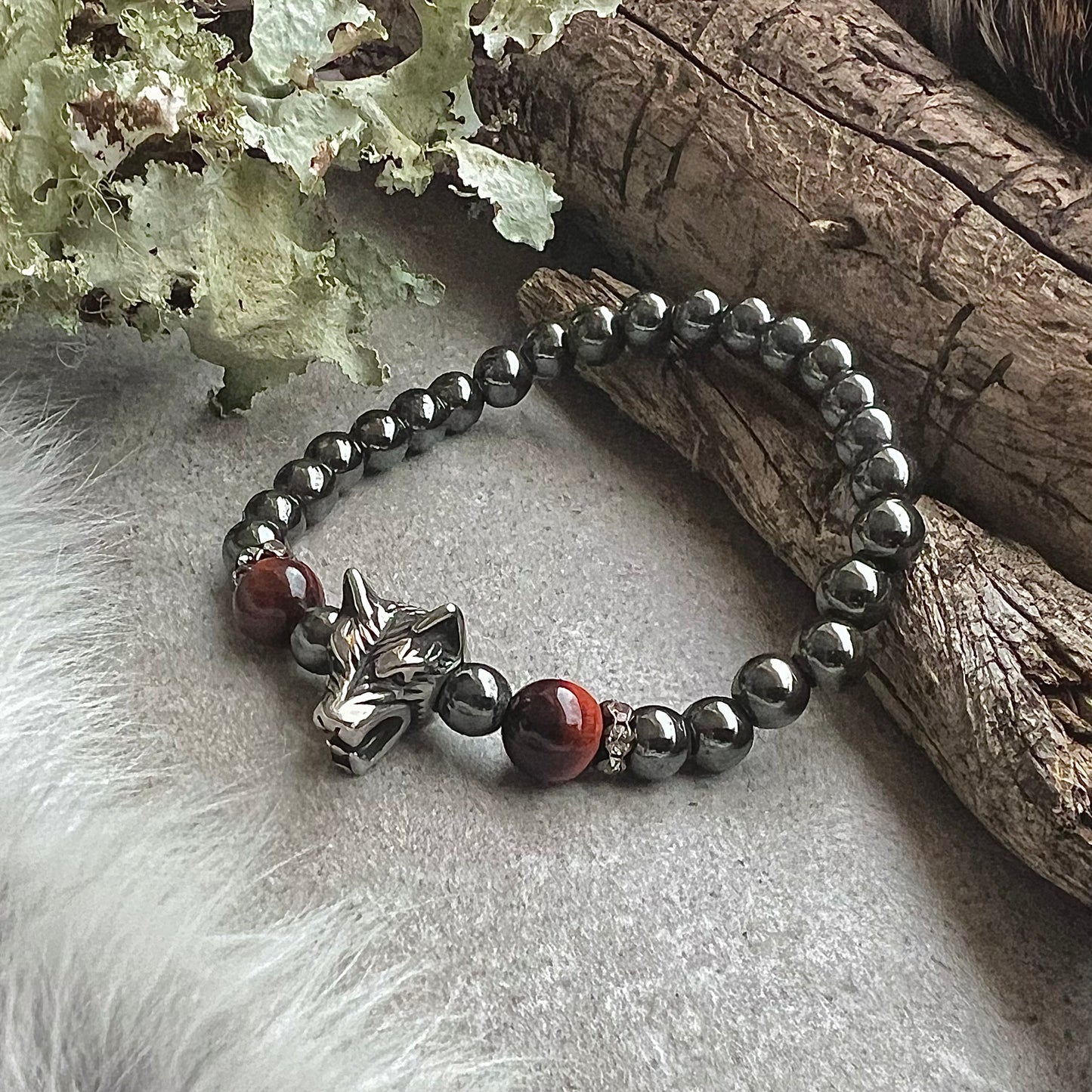 Hematite and red tiger eye bracelet with wolf head in stainless steel