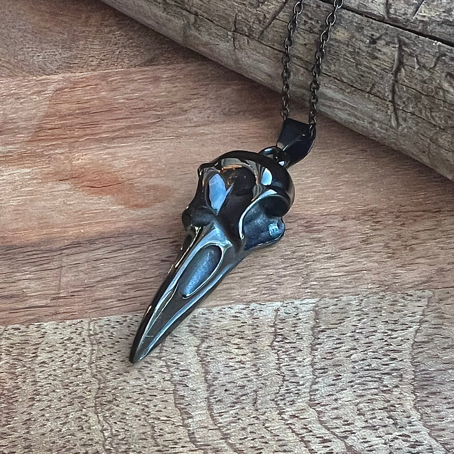 Necklace with large raven head in black, stainless steel