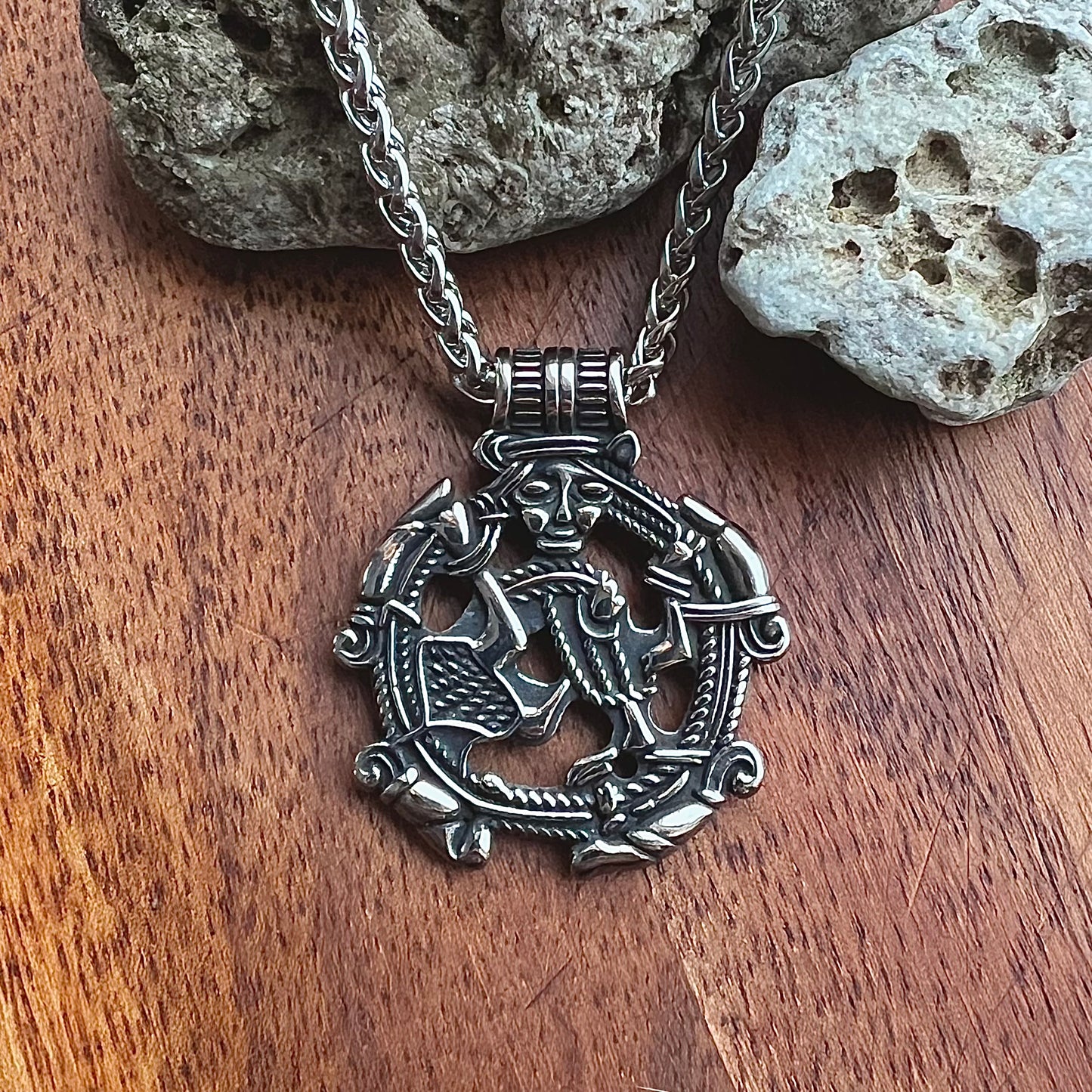 Necklace with grappling hook pendant representing Loki