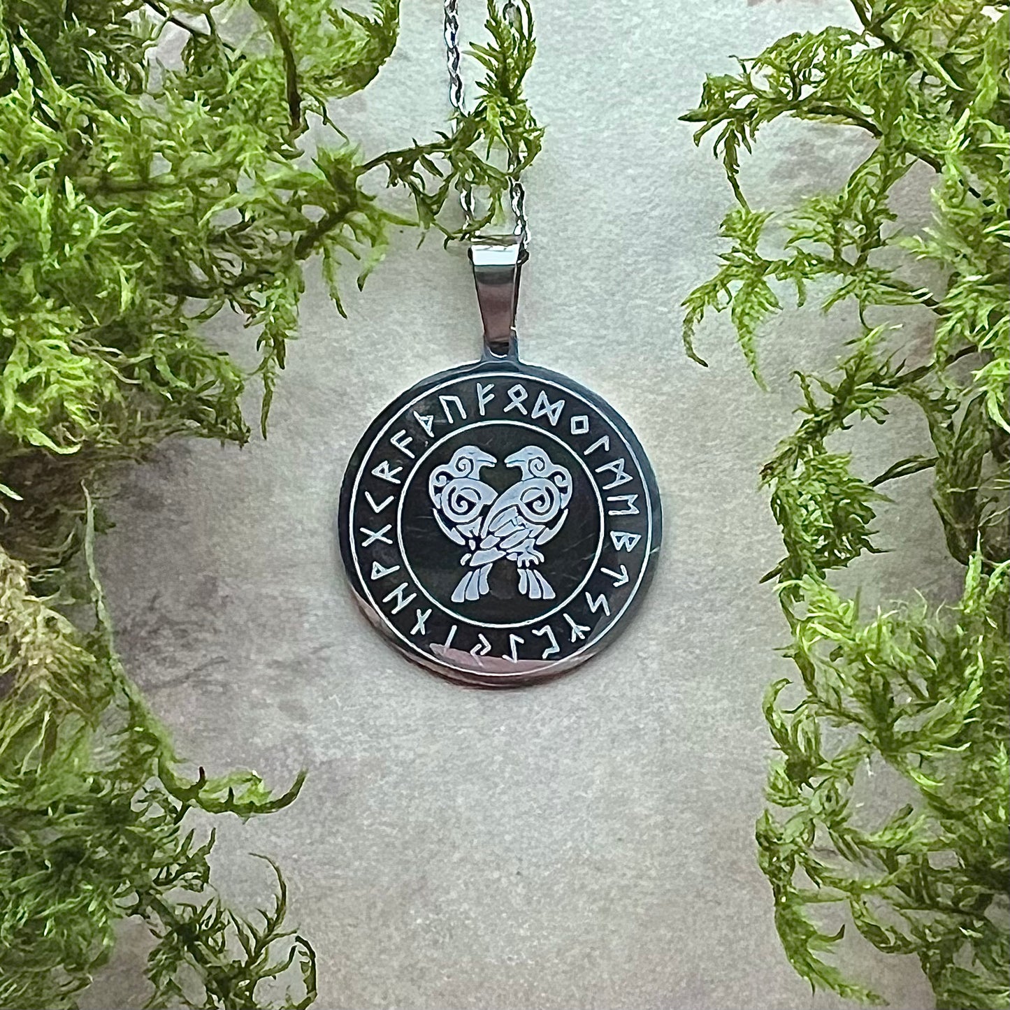 Necklace with Hugin and Munin, etched in stainless steel
