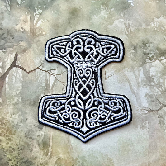 Tygmärke/patch med torshammare. Stryk på-variant.