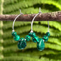 Earrings with drop-shaped malachite