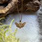 Necklace with skull butterfly in gold-colored steel