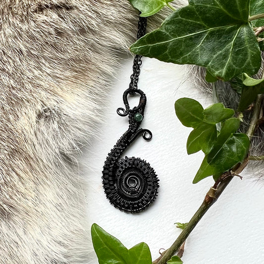 Necklace with the Midgard Serpent of black copper wire and eye of jade