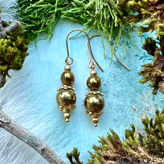 Kristallörhängen med pärlor och guldfärgat stål