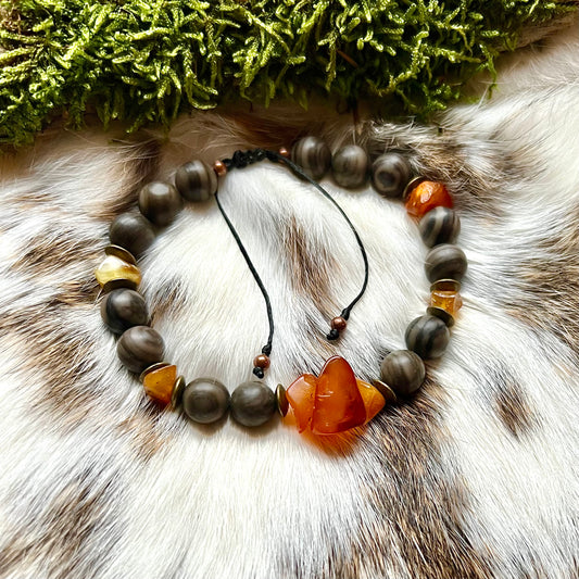 Justerbart armband med bärnsten och trämönstrad agat