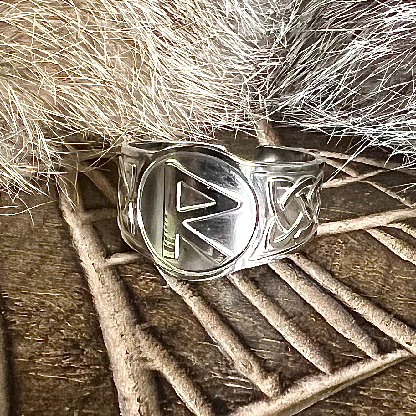 Adjustable steel ring with the rune Reid