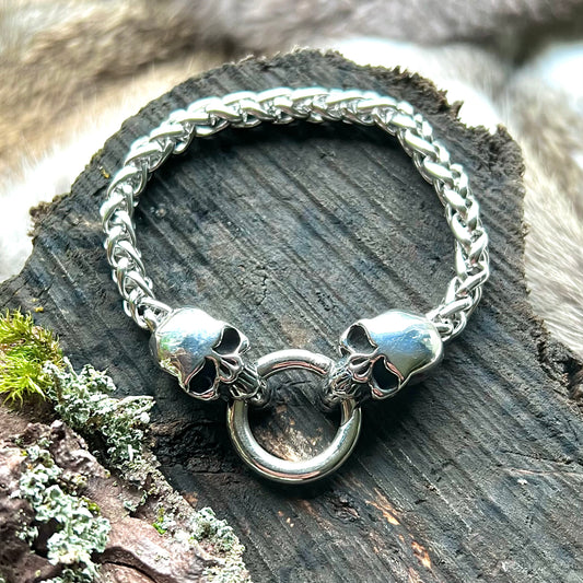 Stainless steel bracelet with wheat link and skulls