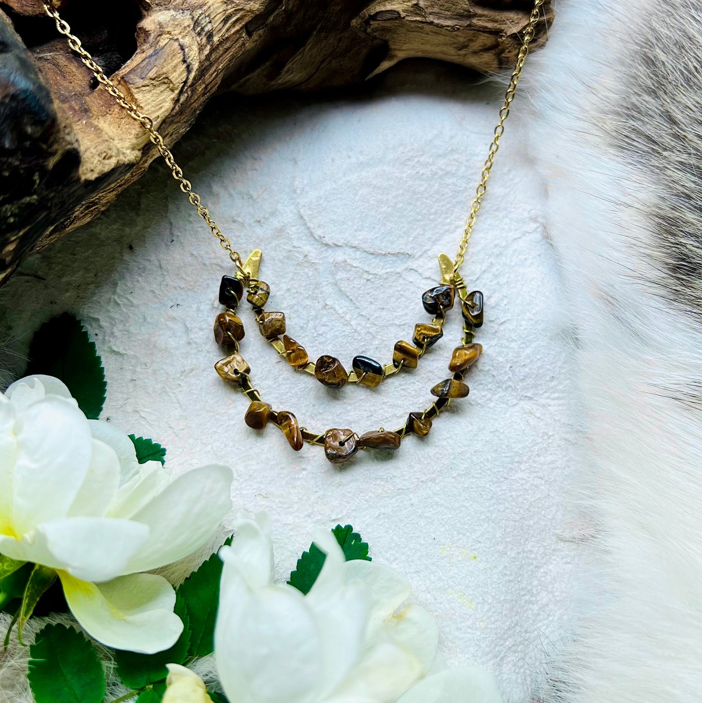 Necklace with crescent moon and tiger's eye