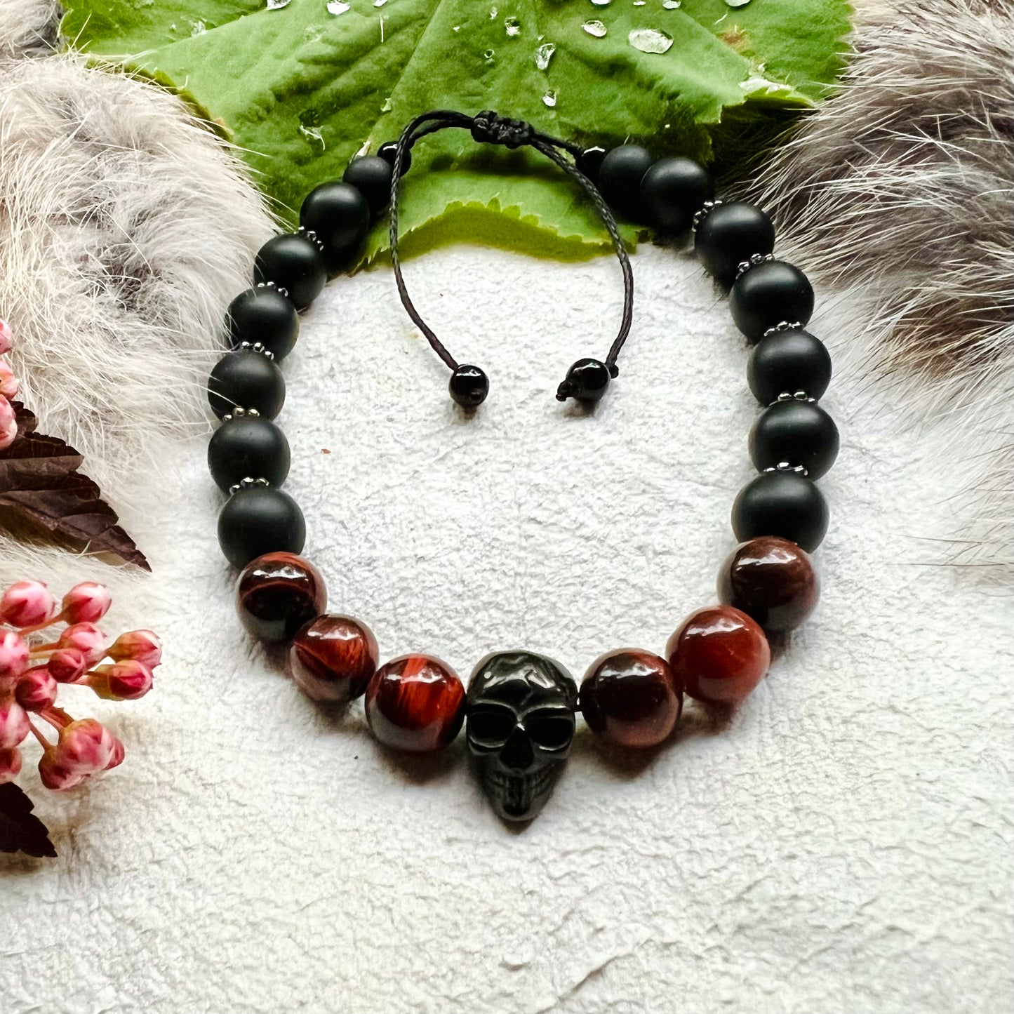 Bracelet with skull in black steel, red tiger's eye and frosted glass