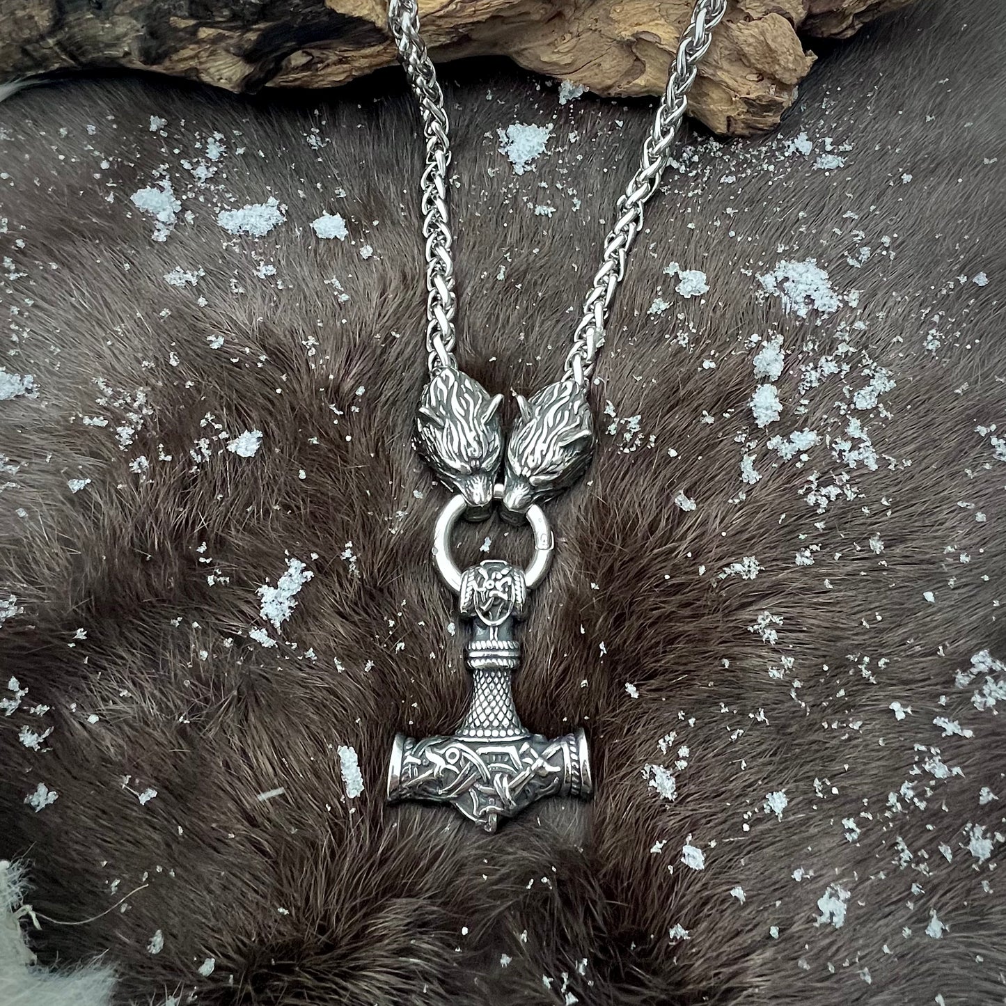 Steel necklace with wolf heads and Thor’s hammer